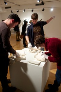 Installation view of "Mark the Loss," 2013, set of three books enclosed in cases, photo by Lauren Well