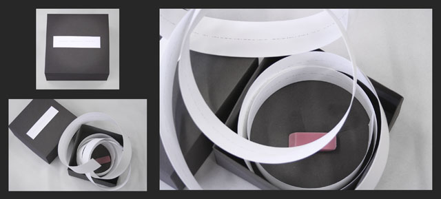 Line for Line (Gertrude Stein's "A Long Dress" remediated), 2011, graphite on 2" x 110" BFK, handmade box, and eraser 