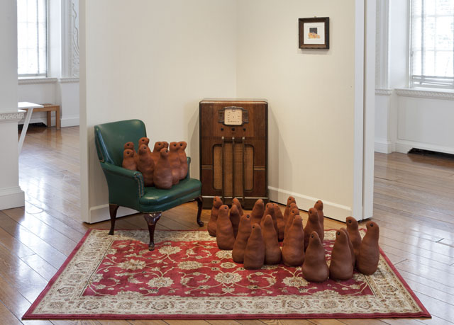 War of the Worlds , 2013 Stuffed fabric prairie dogs, buttons, rug, vintage 1930′s radio, collage