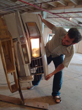 Aaron Treher with his exhibit at The Thought Lot(Public Opinion/Vicky Taylor)