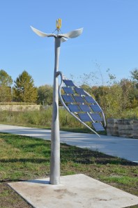 After Trillium, 2013, cast aluminum, glass, custom photovoltaic and electronics, 108"x24"x36"