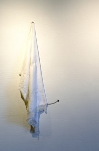 There are no Edens (unactivated), old pillowcase, artist’s hair, vinyl 28” x 32” x 2” 2014 