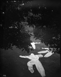 where shadows play  #389 medium monochrome large format photograph (8x10), with protective work suits size 16 inches w x 20 inches h year 2014