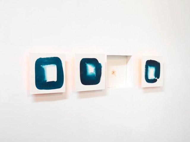 Exposed Square II 2014 installation of floating apertures and exposed figment acrylic on watercolor paper with wood mount and sheetrock 7 x 33 inches