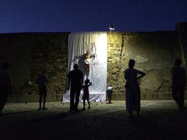 .   “From The Top” Performance. Materials: black tempra paint, white fabric, red wine, black balloons, rope, ladder. Rigging materials: sand, stone, barrels, nails, harness, iron rods, rope. 2014 