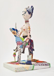 The Mistress, her Baby and the Ejaculating Unicorn 2014 | 41 x 64 x 30 cm | Wood, found Objects, Recycled textiles, Pre- owned Toy parts, Fibre Stuffing *Farsi text Translation: Affection (front), And the rest of the stories (back)