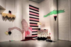 Shape Shifters 2013 installation at Cornish College of the Arts 10x10x12' house paint, acrylic, tape, paper, vinyl, cardboard, fabric, altered found objects photo credit: David Wentworth