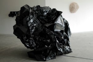 CURDLE , Mylar tape, plastic, motor, hardware. 50”x50”x50”. 2015 (on going series) 