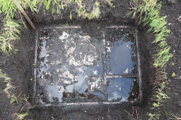 The Roadside Museum (excavation documentation, dimensions variable, 2014): still from a short film documenting the lengthy excavation of a 2.4 x 1.8 metre painting buried unprotected on a farm.