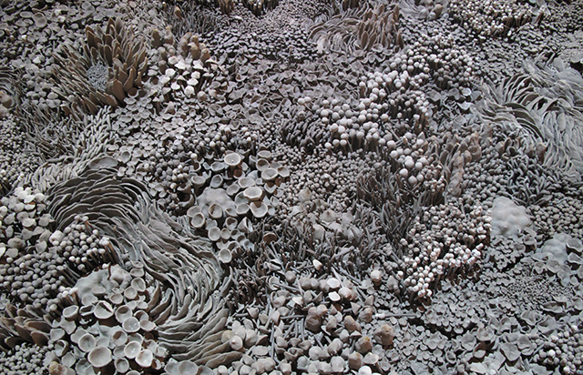 Stay on the Path (detail), Unfired clay, video projection, 4’’ x 66’’ x 102’’, 2013