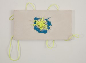 banana gas through a fog mask, concrete, plaster, tape, plastic, neon parachute cord, approx. 19”x 25-1/4” x 1,” 2015