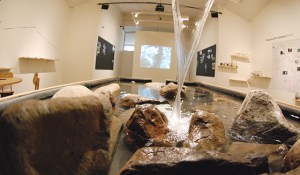 Title: Mapping the Spokane (River) Medium: water, rubber, rocks, photos, glass, etc... Dimensions: 10’ x 16’ x 40’ Year: 2013