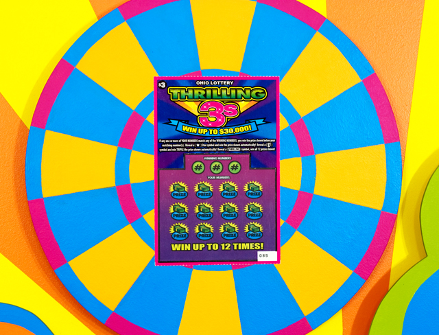 One of These Days (detail), 2013, sintra, synthetic polymer, unscratched lottery ticket, wood, 34" x 40" x 3.5"