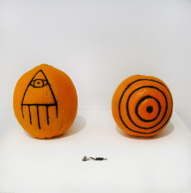 Poke oranges, india ink, needles variable dimensions 2012