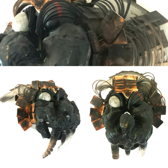 title: untitled (moon guardian) Medium: burned wood, resin, oil, spray paint, drywall, polystyrene foam, brad nails, wood glue Size: 18"x26"x12" year 2015